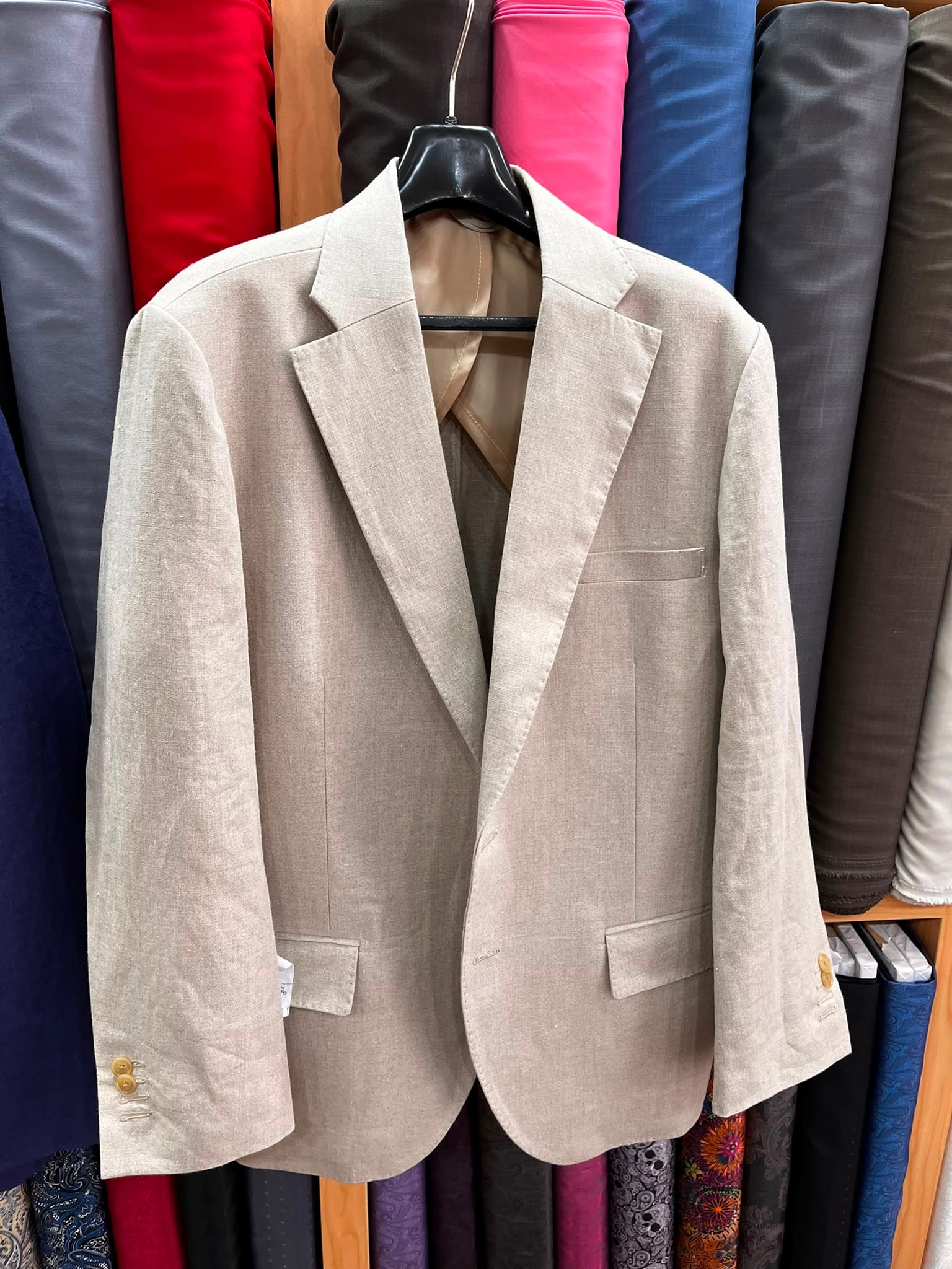 Custom beige linen blazer crafted at Velour & Waza